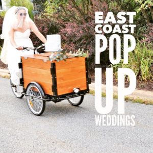 A bride riding a custom stained cedar box ice cream bike down the street and big text "East Coast Popup weddings"